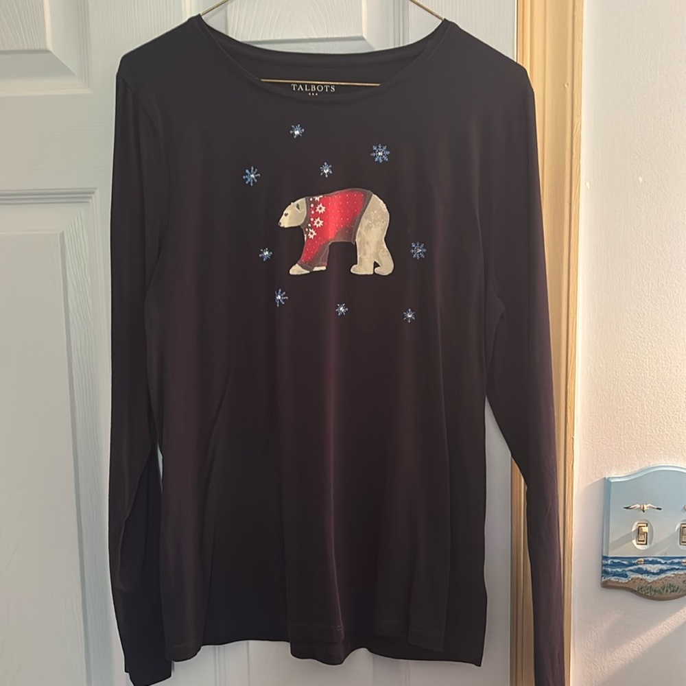 long sleeve Navy blue top with a polar bear and snowflakes on the front